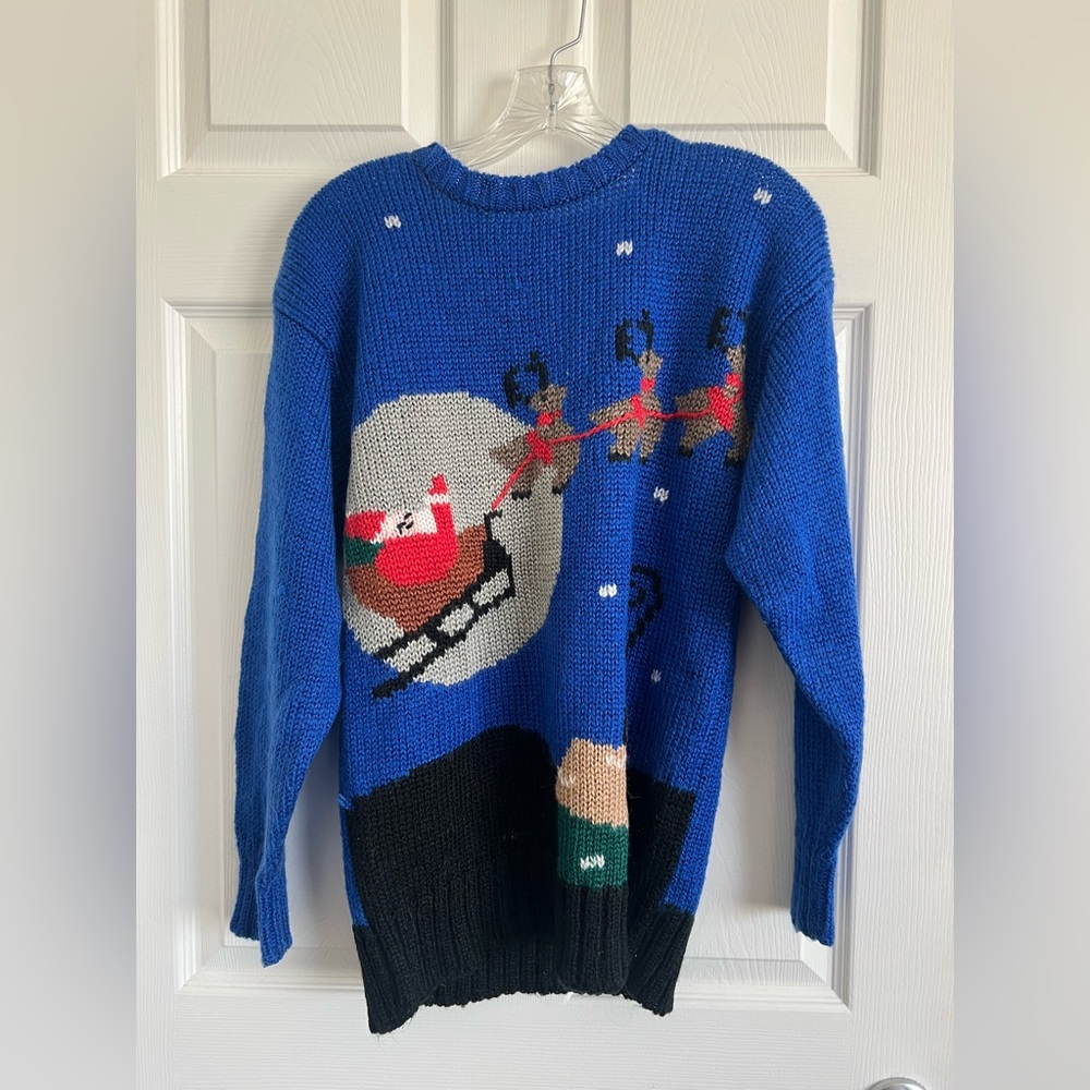 Vintage size small Pinwheel Christmas sweater-70-80’s.  Blue with Santa on roof